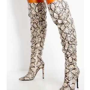 Thigh high snake skin boots